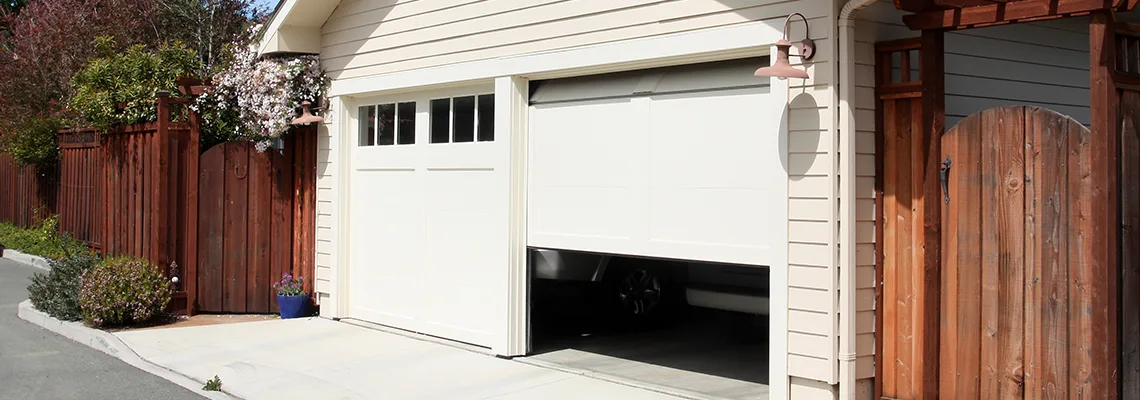 Fix Metal Garage Door Jerking in East St. Louis, Illinois